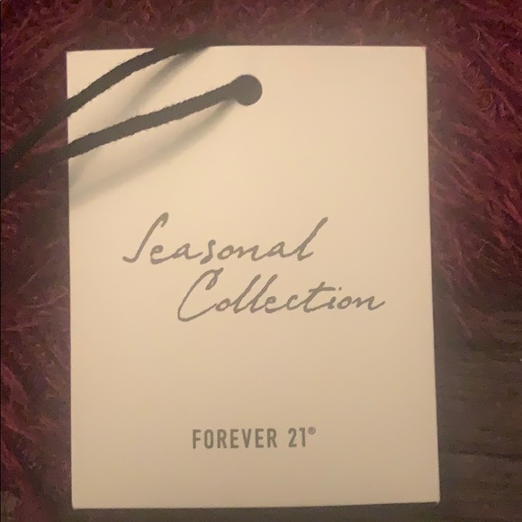 A maroon dress, fluffy. - Picture 3 of 3